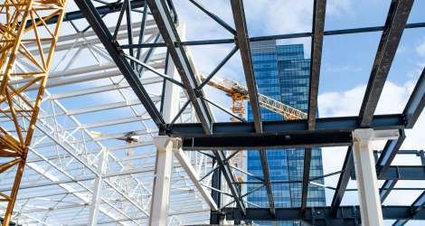 construction-site-with-steel-frame-structure-and-c-2024-10-18-08-31-20-utc_11zon.jpg